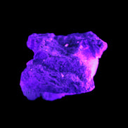 Tiny Aquamarine crystals in Mica, Lepidolite Feldspar matrix 46*42*30mm 198ct 39.6g in UV light - Rocks and Things Store