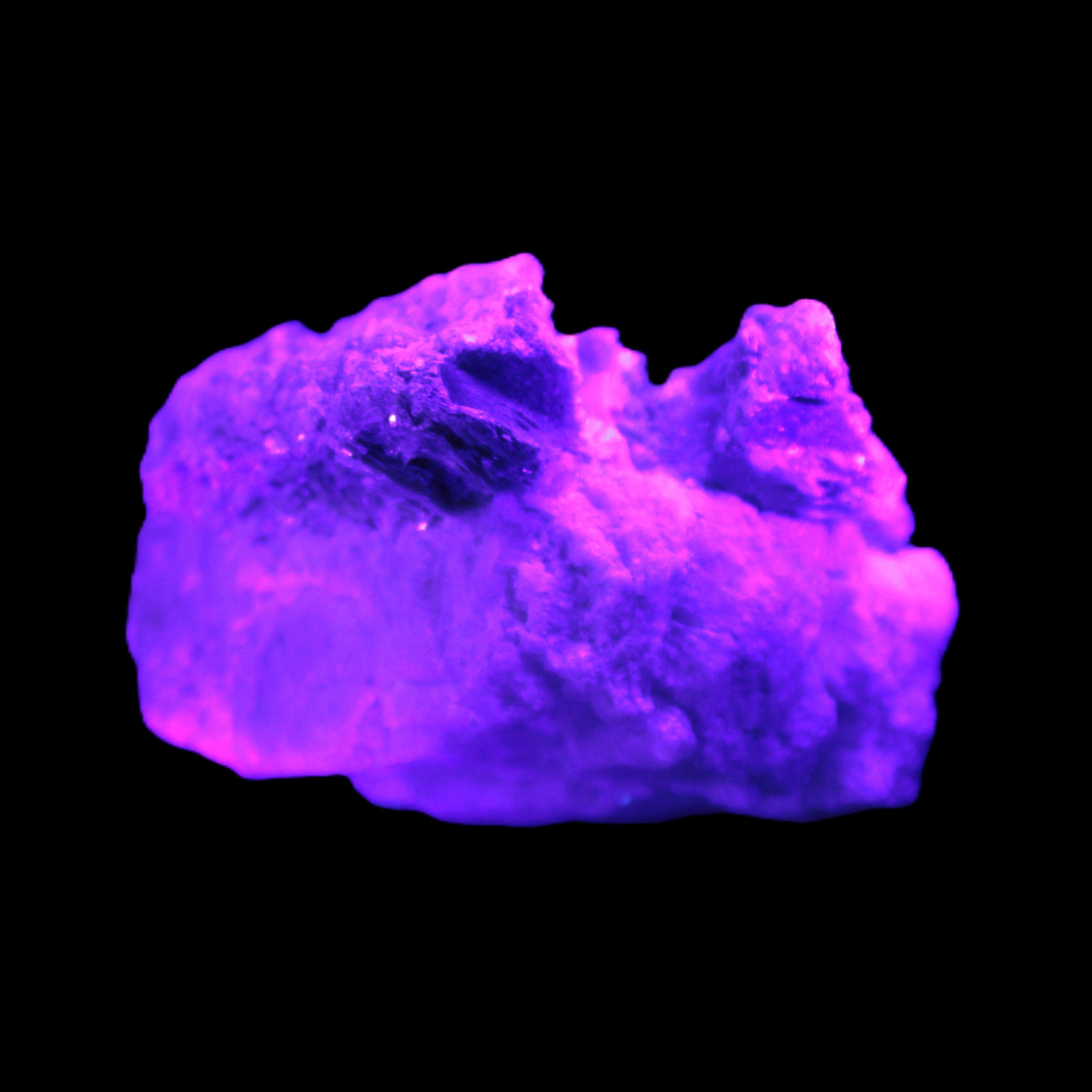 Tiny Aquamarine crystals in Mica, Lepidolite Feldspar matrix 46*42*30mm 198ct 39.6g in UV light - Rocks and Things Store