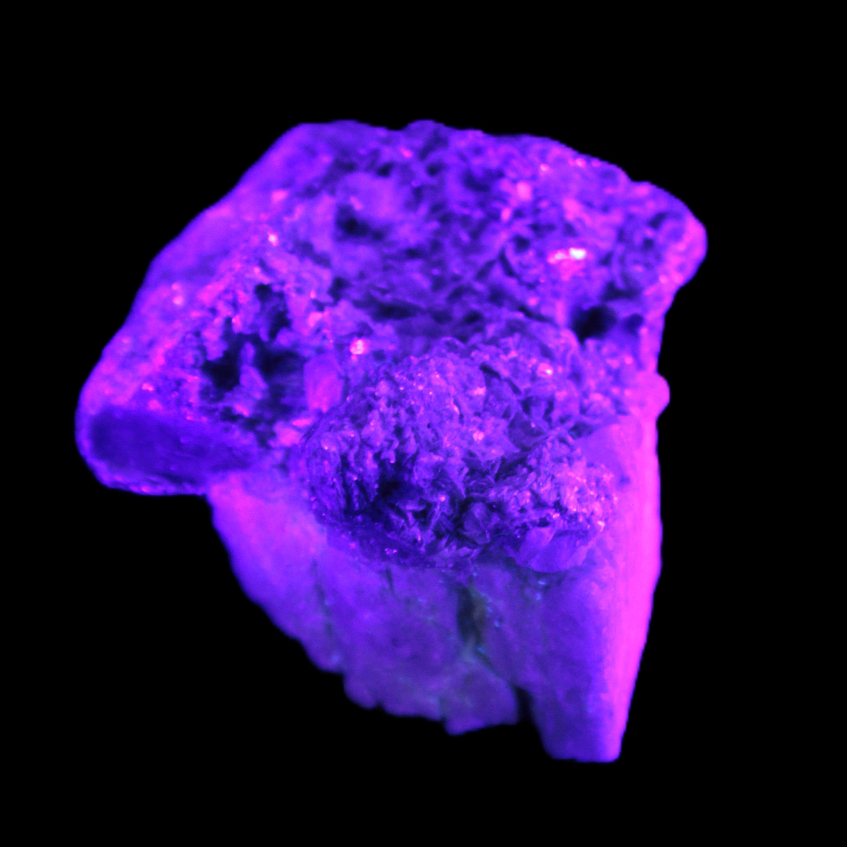 Tiny Aquamarine crystals in Mica, Lepidolite Feldspar matrix 46*42*30mm 198ct 39.6g in UV light - Rocks and Things Store