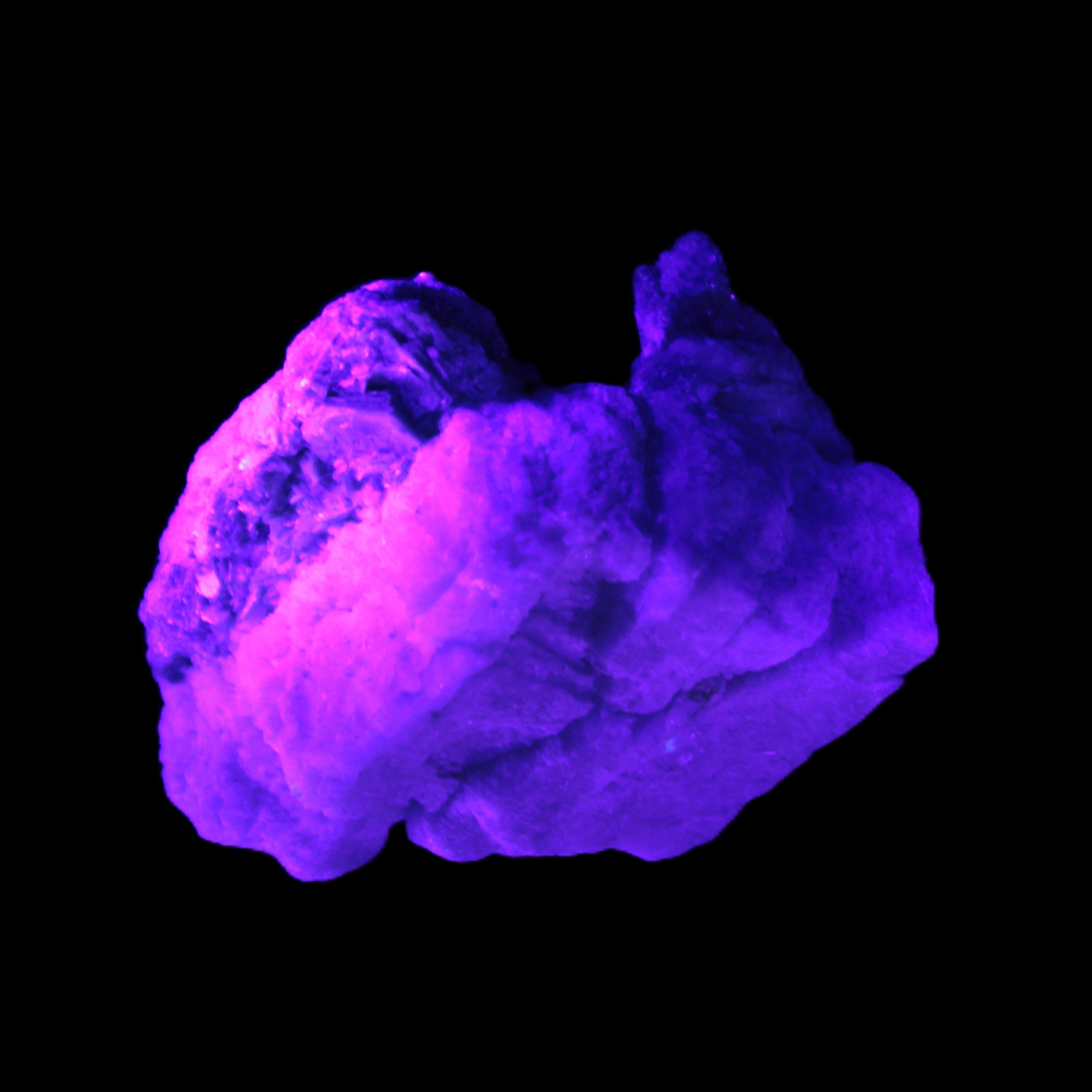 Tiny Aquamarine crystals in Mica, Lepidolite Feldspar matrix 46*42*30mm 198ct 39.6g in UV light - Rocks and Things Store