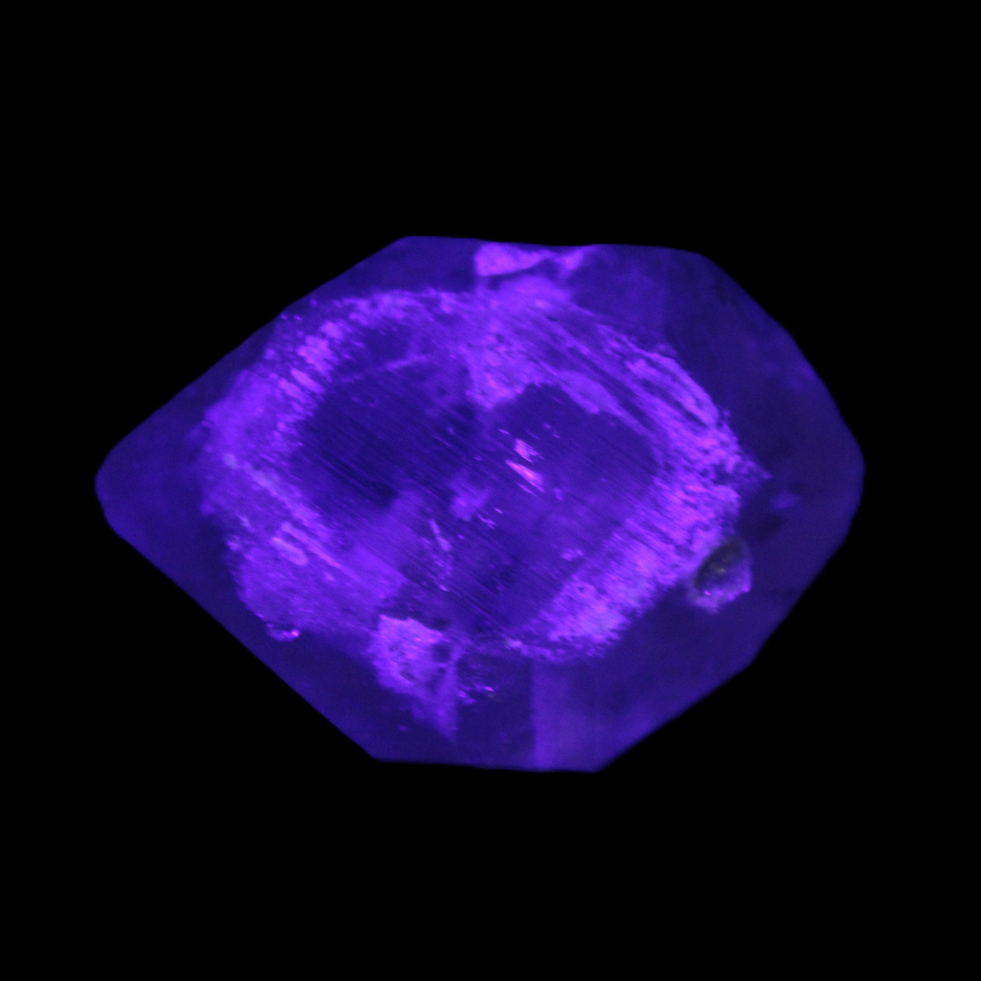 Double-terminated Quartz from Skardu 38*14*22mm 17.8g in UV light - Rocks and Things Store