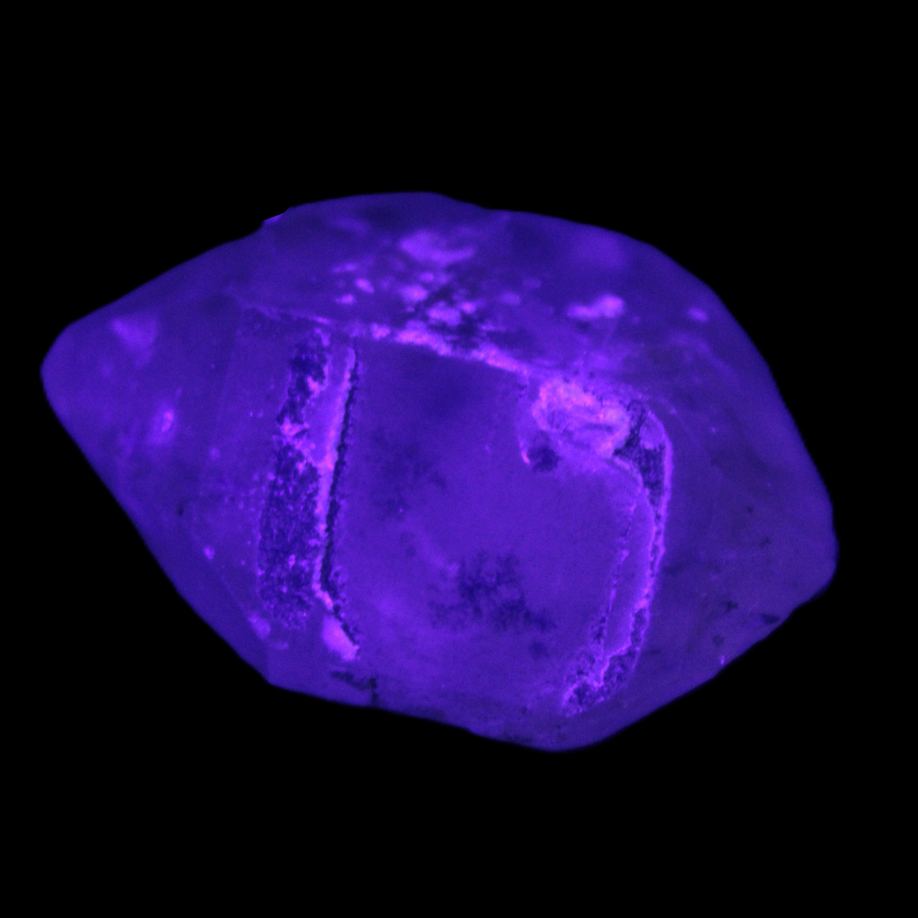 Double-terminated Quartz from Skardu 38*14*22mm 17.8g in UV light - Rocks and Things Store