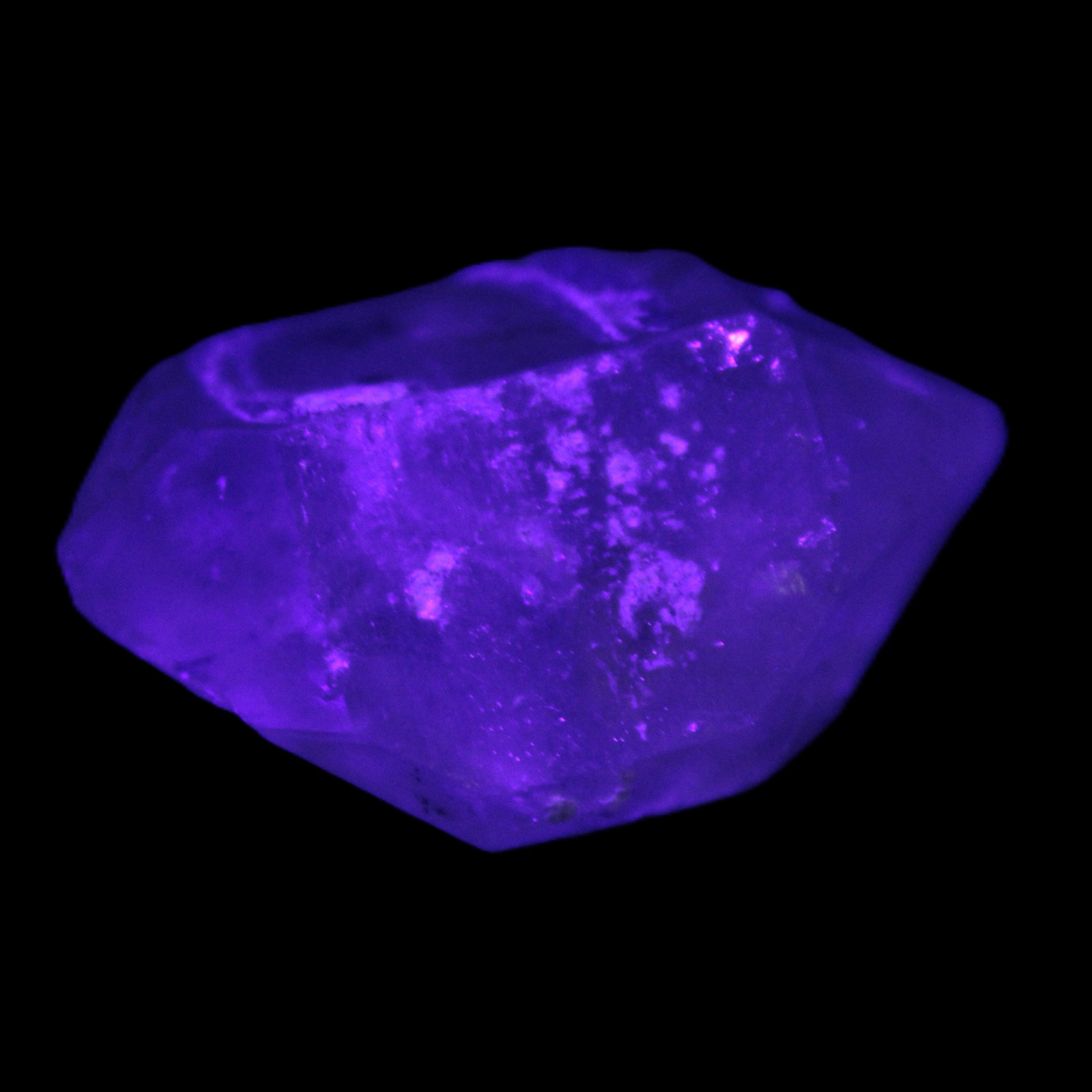 Double-terminated Quartz from Skardu 38*14*22mm 17.8g in UV light - Rocks and Things Store