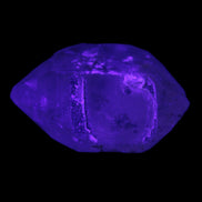 Double-terminated Quartz from Skardu 38*14*22mm 17.8g in UV light - Rocks and Things Store