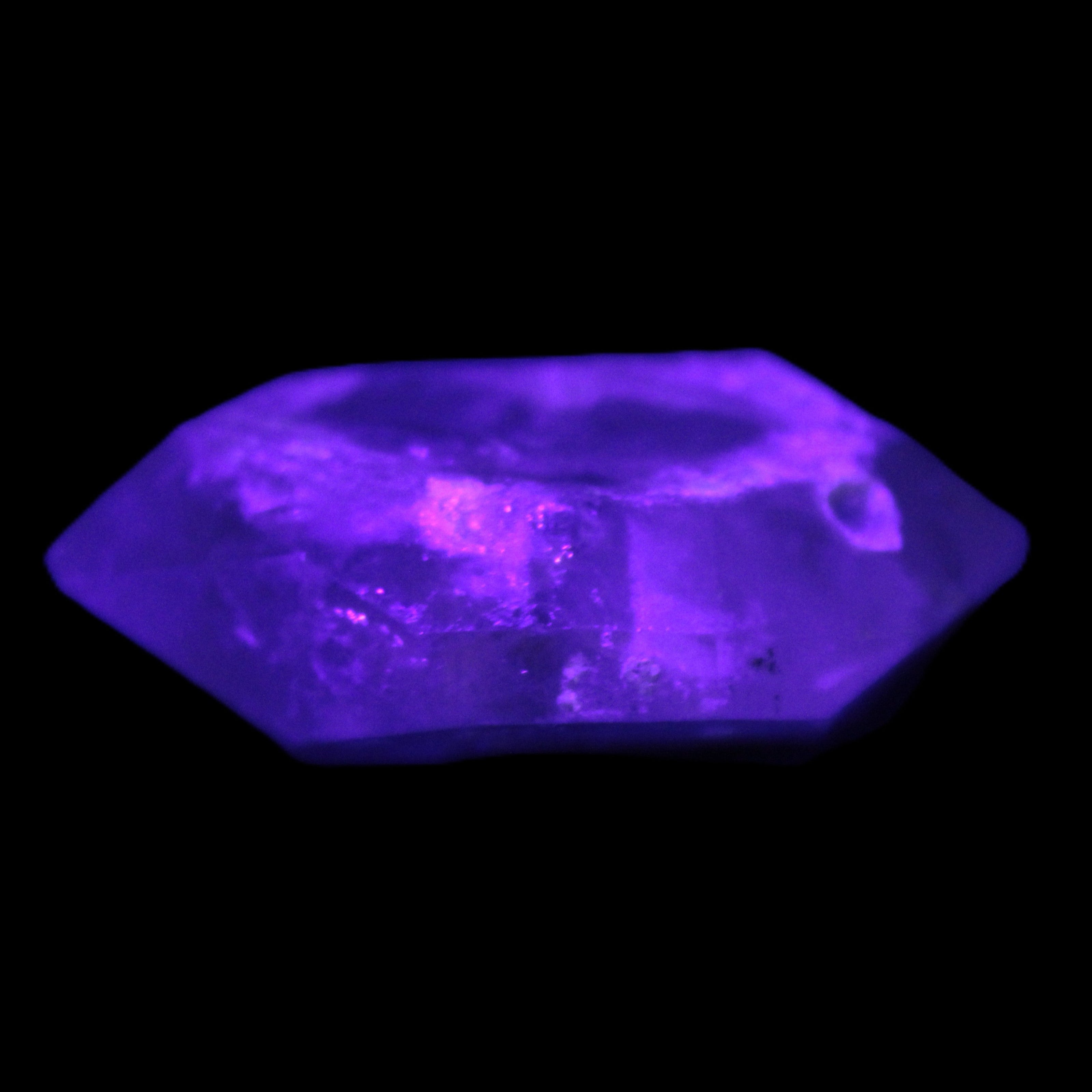 Double-terminated Quartz from Skardu 38*14*22mm 17.8g in UV light - Rocks and Things Store