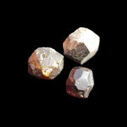 Garnets three natural crystals from Pakistan 8.2g in sunlight - Rocks and Things Store