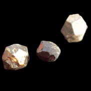 Garnets three natural crystals from Pakistan 8.2g in sunlight - Rocks and Things Store