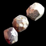 Garnets three natural crystals from Pakistan 8.2g in sunlight - Rocks and Things Store
