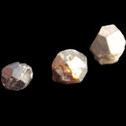 Garnets three natural crystals from Pakistan 8.2g in sunlight - Rocks and Things Store