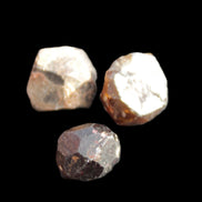 Garnets three natural crystals from Pakistan 8.2g in sunlight - Rocks and Things Store