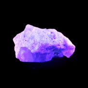 Aquamarine crystal on matrix from Afghanistan 9.2g in UV light - Rocks and Things Store