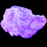 Aquamarine crystal on matrix from Afghanistan 9.2g in UV light - Rocks and Things Store