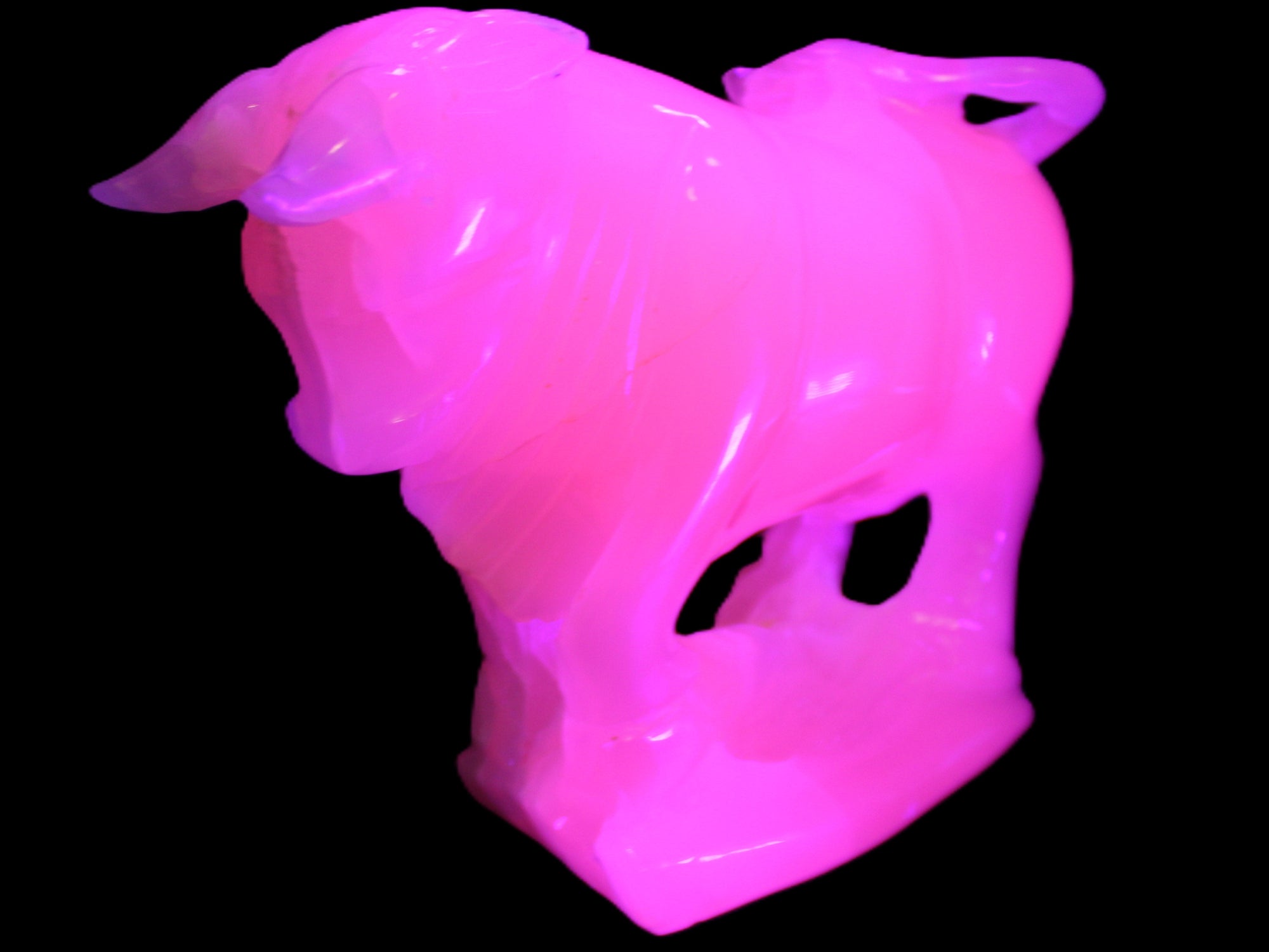 Pink Mangano Calcite Bull 240*85*78mm 3110g in UV light  - Rocks and Things Store
