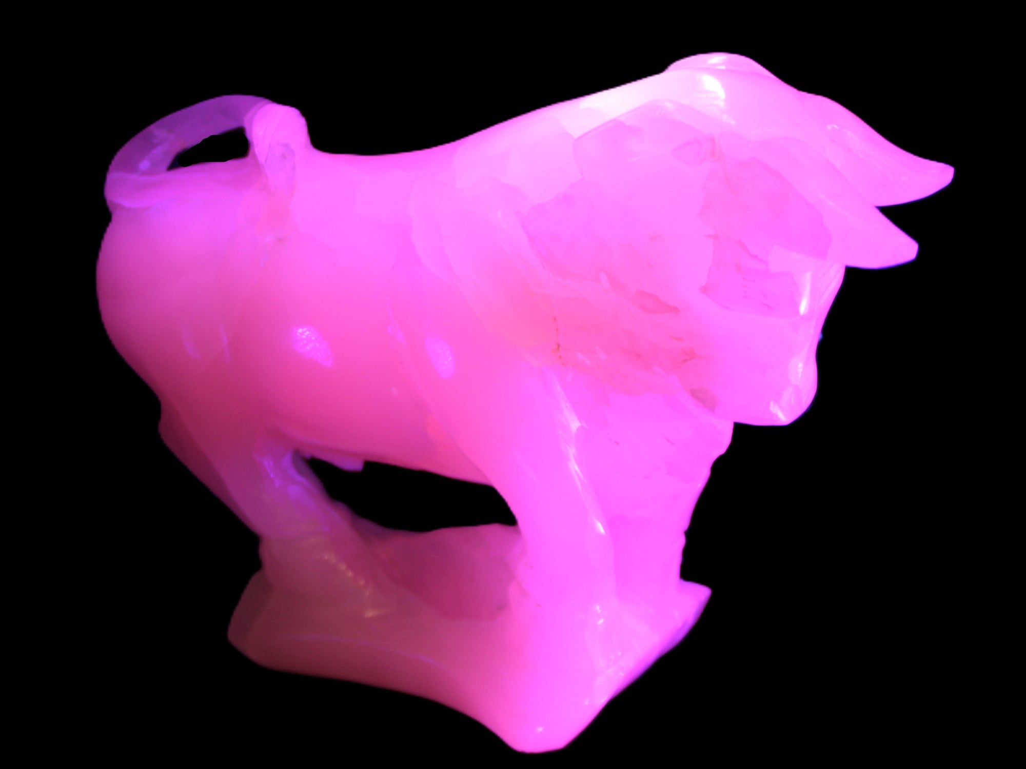 Pink Mangano Calcite Bull 240*85*78mm 3110g in UV light  - Rocks and Things Store
