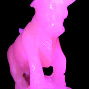 Pink Mangano Calcite Bull 240*85*78mm 3110g in UV light  - Rocks and Things Store