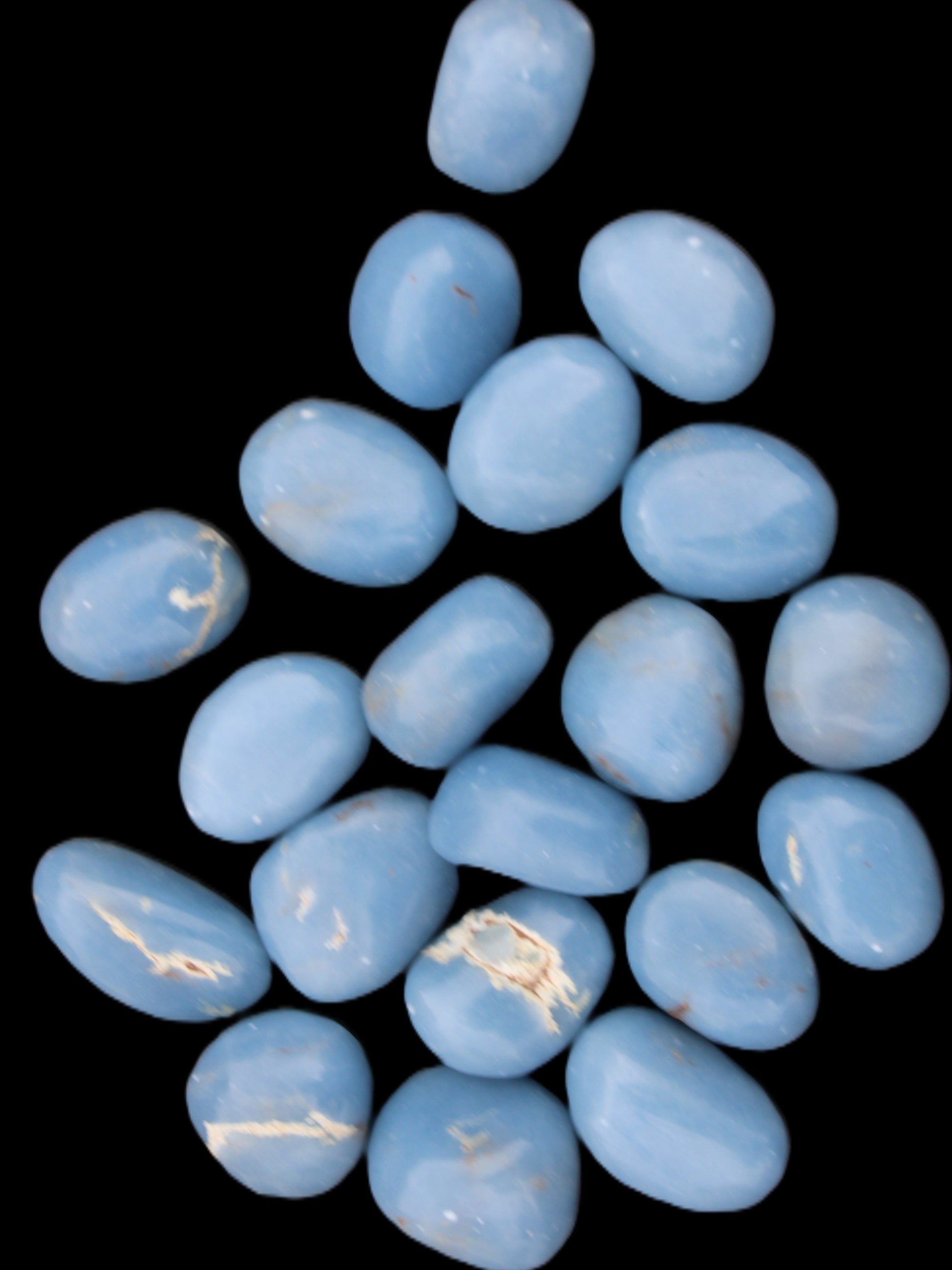 Angelite 20 tumbled stones 24-28mm 300g in sunlight - Rocks and Things Store
