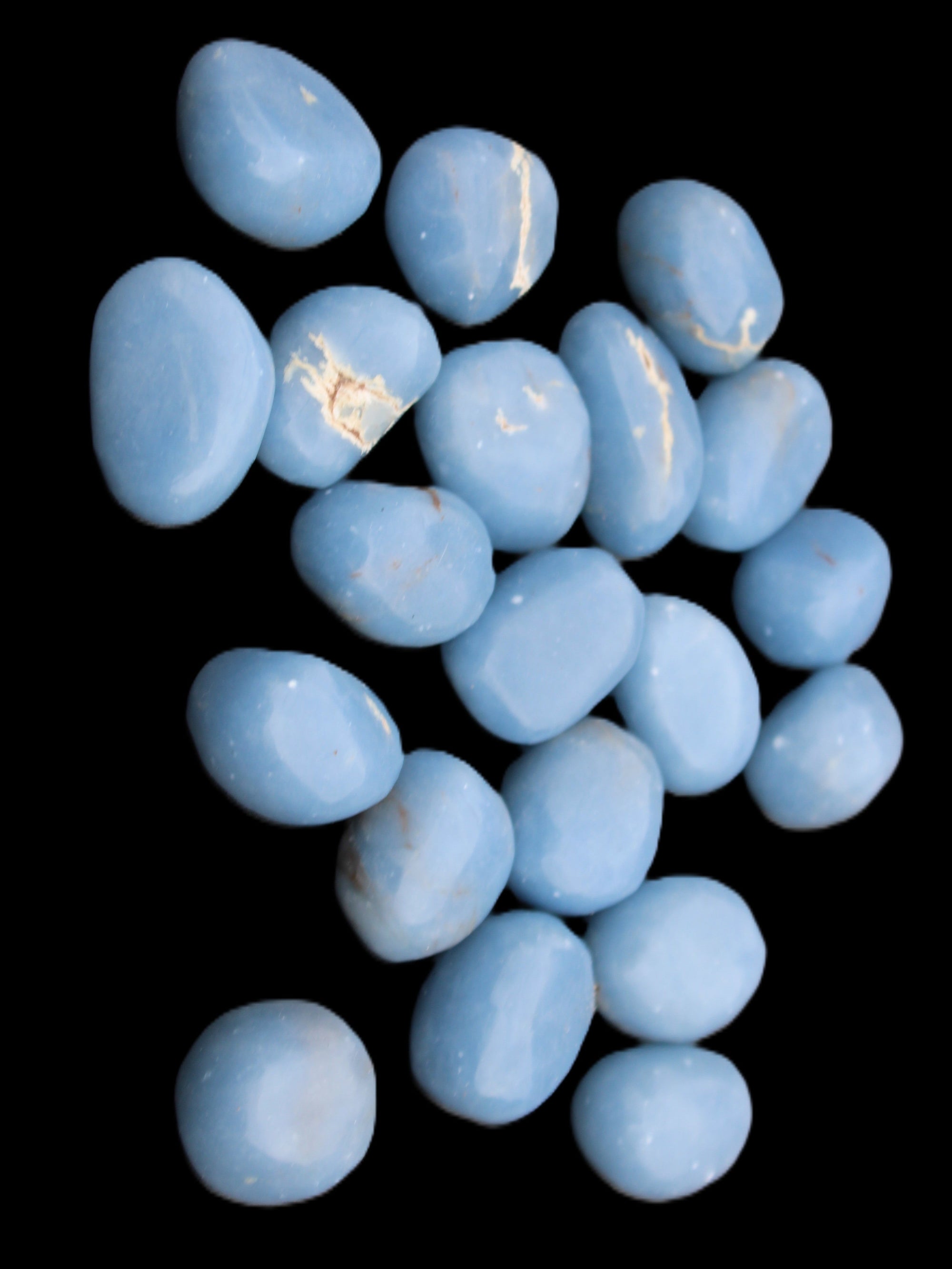 Angelite 20 tumbled stones 24-28mm 300g in sunlight - Rocks and Things Store
