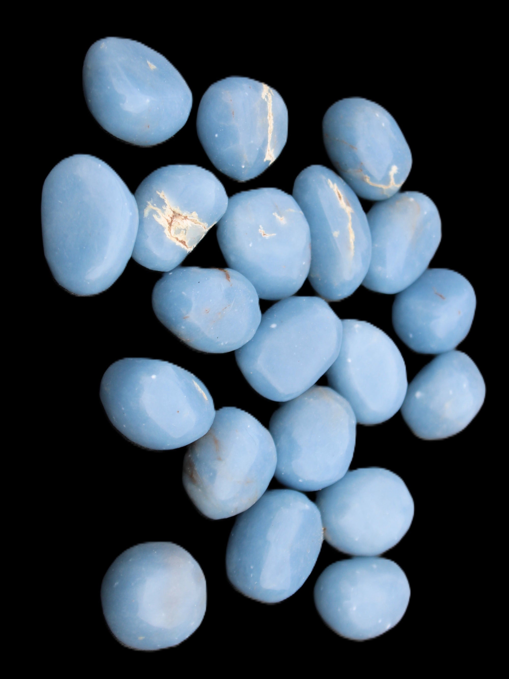 Angelite 20 tumbled stones 24-28mm 300g in sunlight - Rocks and Things Store