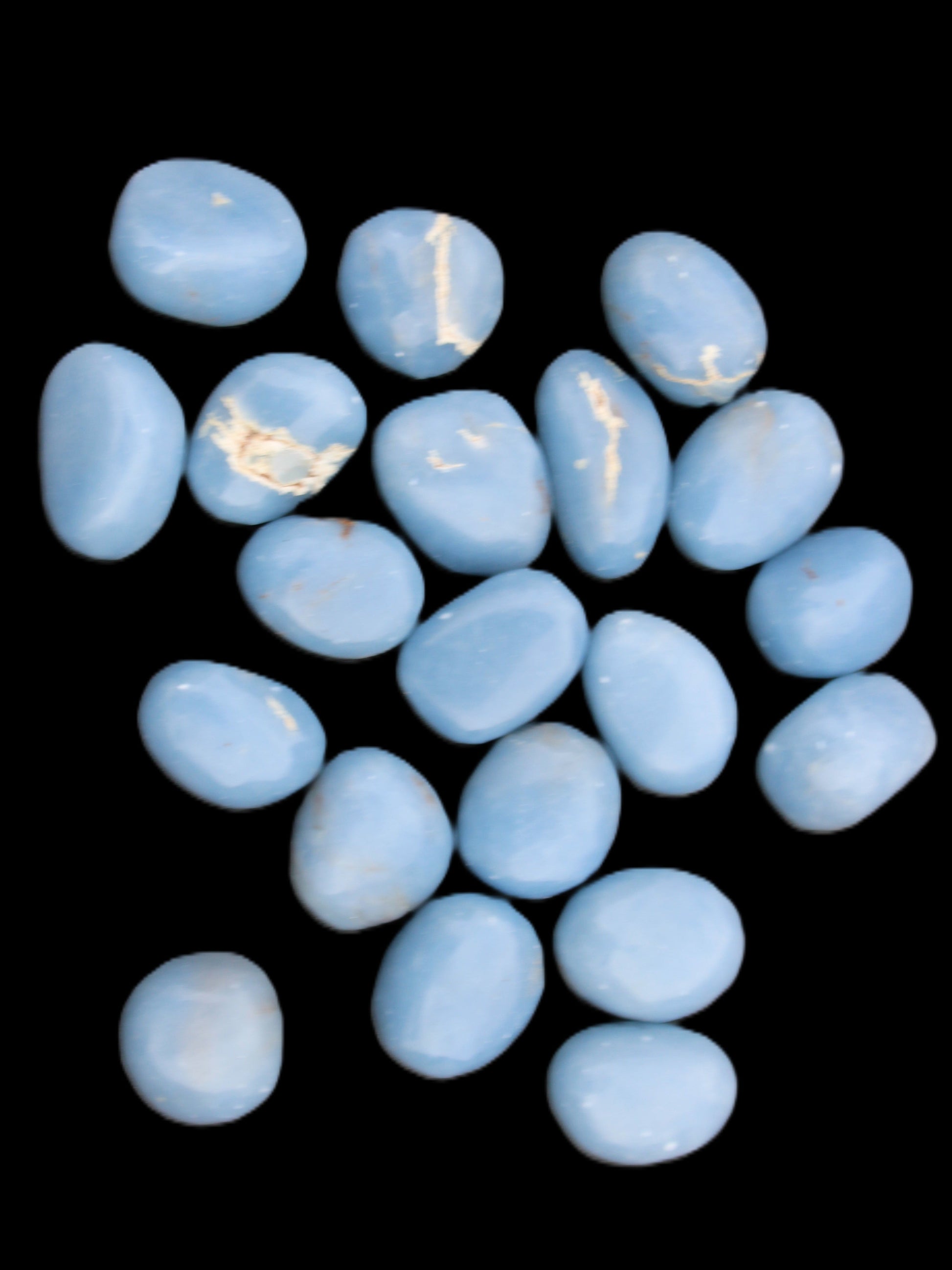 Angelite 20 tumbled stones 24-28mm 300g in sunlight - Rocks and Things Store