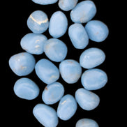 Angelite 20 tumbled stones 24-28mm 300g in sunlight - Rocks and Things Store