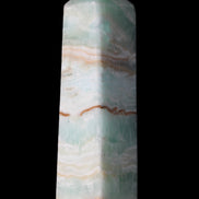 Pistachio Calcite obelisk 130mm 332g in sunlight - Rocks and Things Store