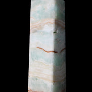 Pistachio Calcite obelisk 130mm 332g in sunlight - Rocks and Things Store