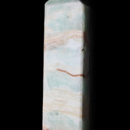 Pistachio Calcite obelisk 130mm 332g in sunlight - Rocks and Things Store