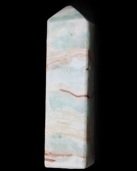 Pistachio Calcite obelisk 130mm 332g in sunlight - Rocks and Things Store