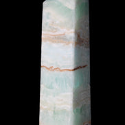 Pistachio Calcite obelisk 130mm 332g in sunlight - Rocks and Things Store