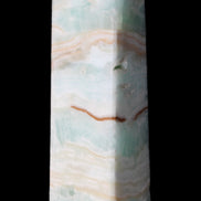 Pistachio Calcite obelisk 130mm 332g in sunlight - Rocks and Things Store