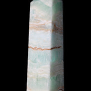 Pistachio Calcite obelisk 130mm 332g in sunlight - Rocks and Things Store