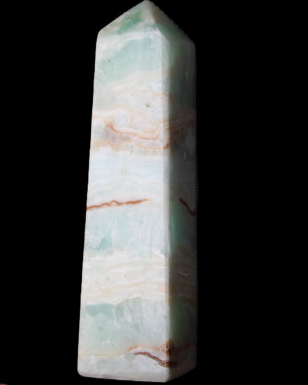 Pistachio Calcite obelisk 130mm 332g in sunlight - Rocks and Things Store