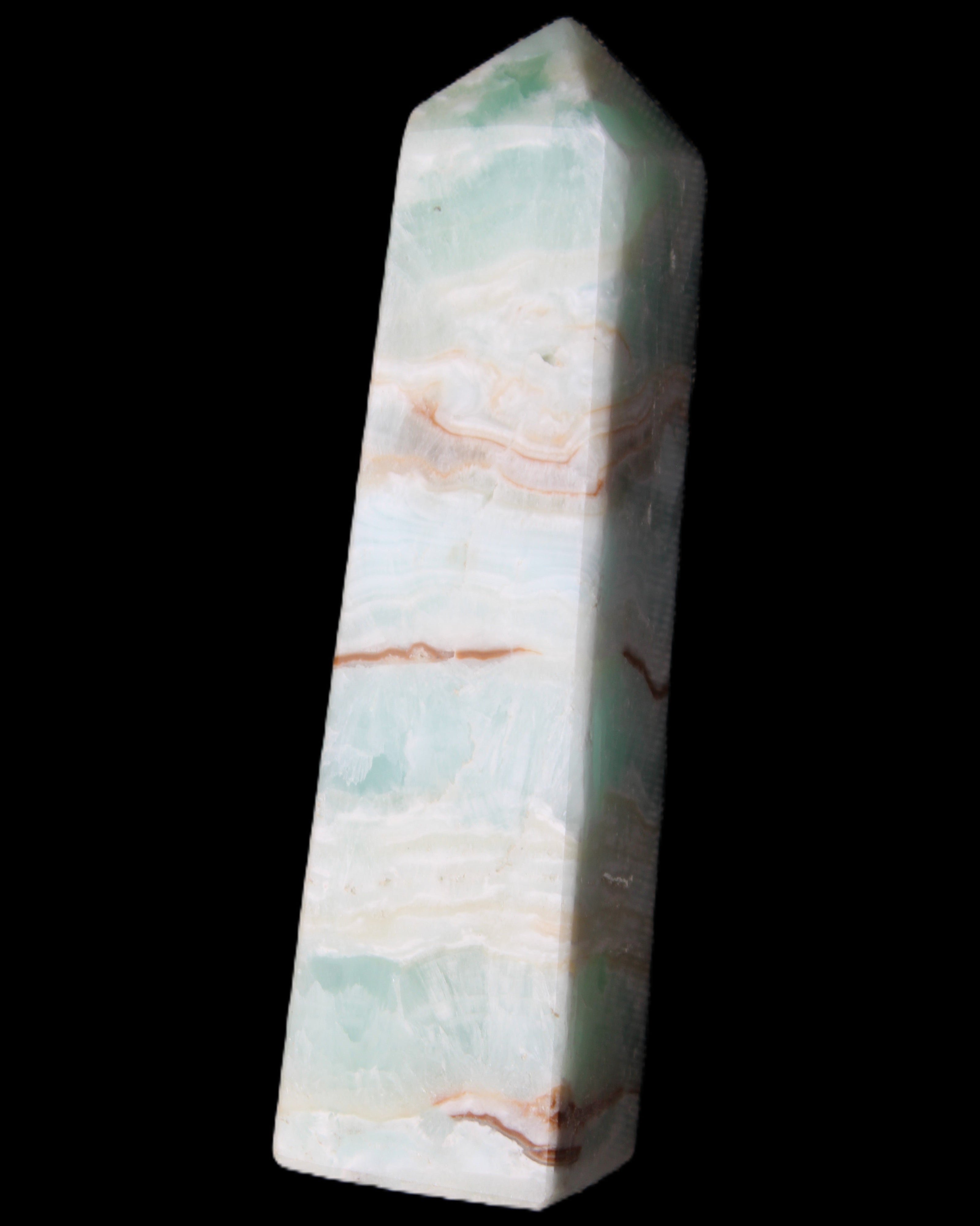 Pistachio Calcite obelisk 130mm 332g in sunlight - Rocks and Things Store