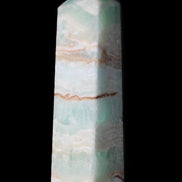 Pistachio Calcite obelisk 130mm 332g in sunlight - Rocks and Things Store