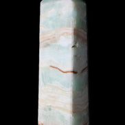 Pistachio Calcite obelisk 130mm 332g in sunlight - Rocks and Things Store