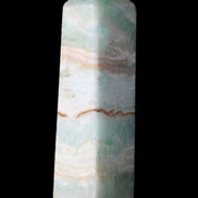 Pistachio Calcite obelisk 130mm 332g in sunlight - Rocks and Things Store