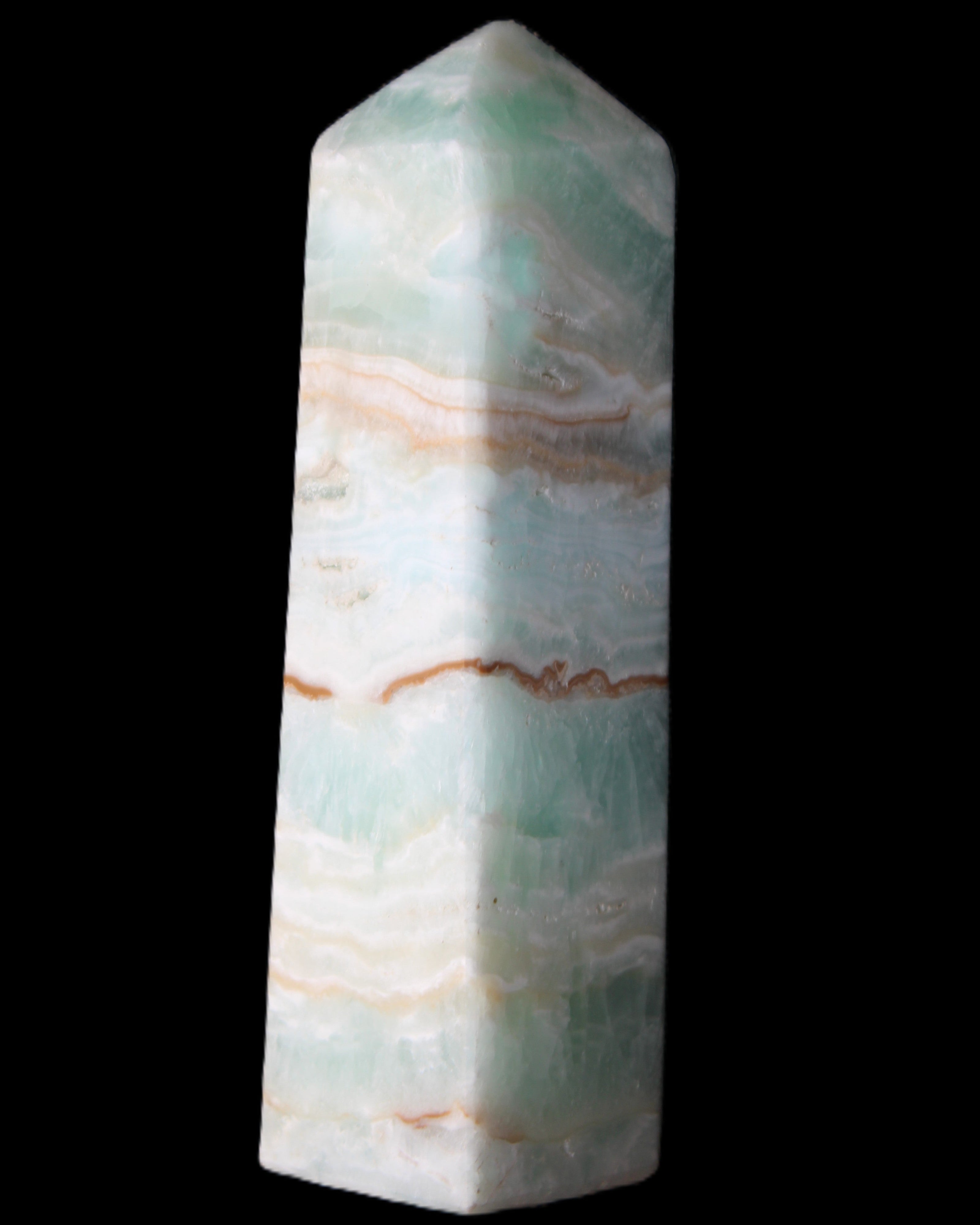 Pistachio Calcite obelisk 130mm 332g in sunlight - Rocks and Things Store
