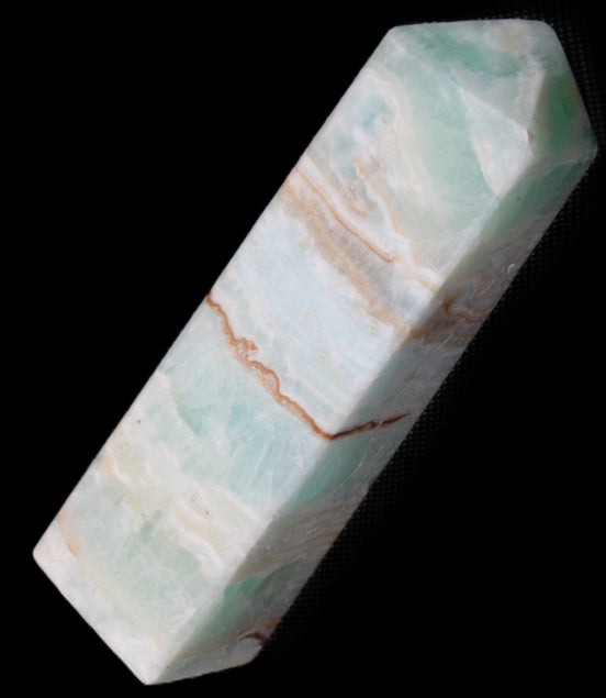Pistachio Calcite obelisk 130mm 332g in sunlight - Rocks and Things Store