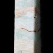 Pistachio Calcite obelisk 130mm 332g in sunlight - Rocks and Things Store