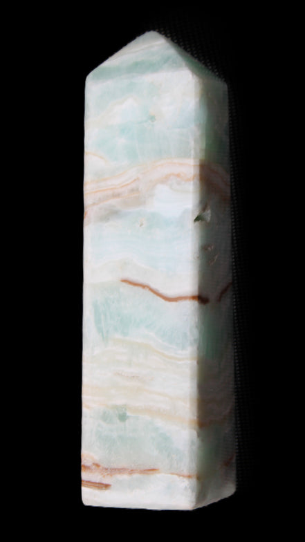 Pistachio Calcite obelisk 130mm 332g in sunlight - Rocks and Things Store