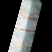 Pistachio Calcite obelisk 130mm 332g in sunlight - Rocks and Things Store