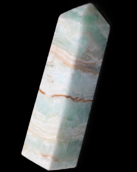 Pistachio Calcite obelisk 130mm 332g in sunlight - Rocks and Things Store