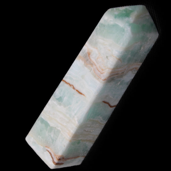 Pistachio Calcite obelisk 130mm 332g in sunlight - Rocks and Things Store