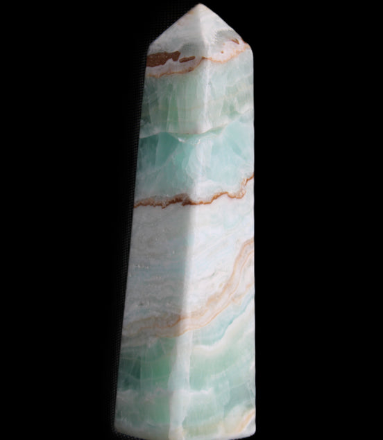 Pistachio Calcite obelisk 155mm 465g in sunlight - Rocks and Things Store