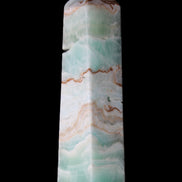 Pistachio Calcite obelisk 155mm 465g in sunlight - Rocks and Things Store