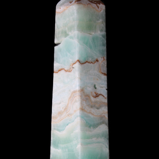 Pistachio Calcite obelisk 155mm 465g in sunlight - Rocks and Things Store