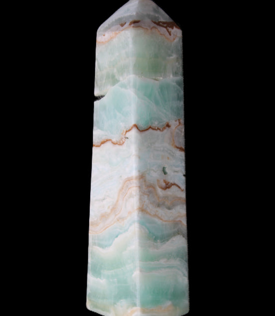 Pistachio Calcite obelisk 155mm 465g in sunlight - Rocks and Things Store