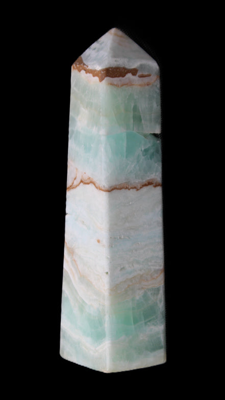Pistachio Calcite obelisk 155mm 465g in sunlight - Rocks and Things Store