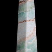Pistachio Calcite obelisk 155mm 465g in sunlight - Rocks and Things Store