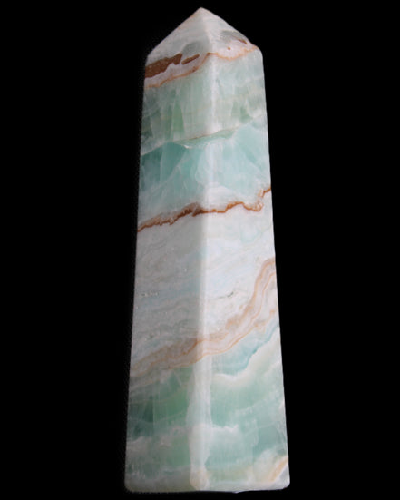 Pistachio Calcite obelisk 155mm 465g in sunlight - Rocks and Things Store